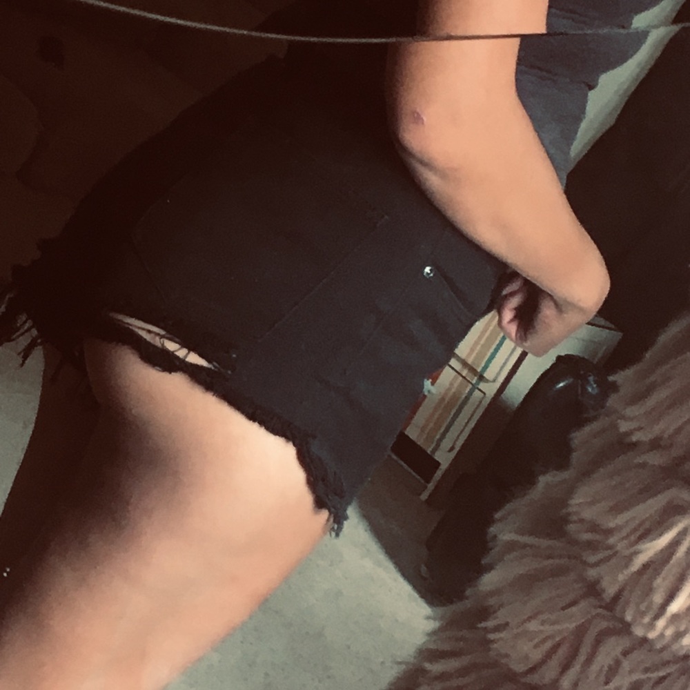 Very cute high waisted. Distressed black shorts